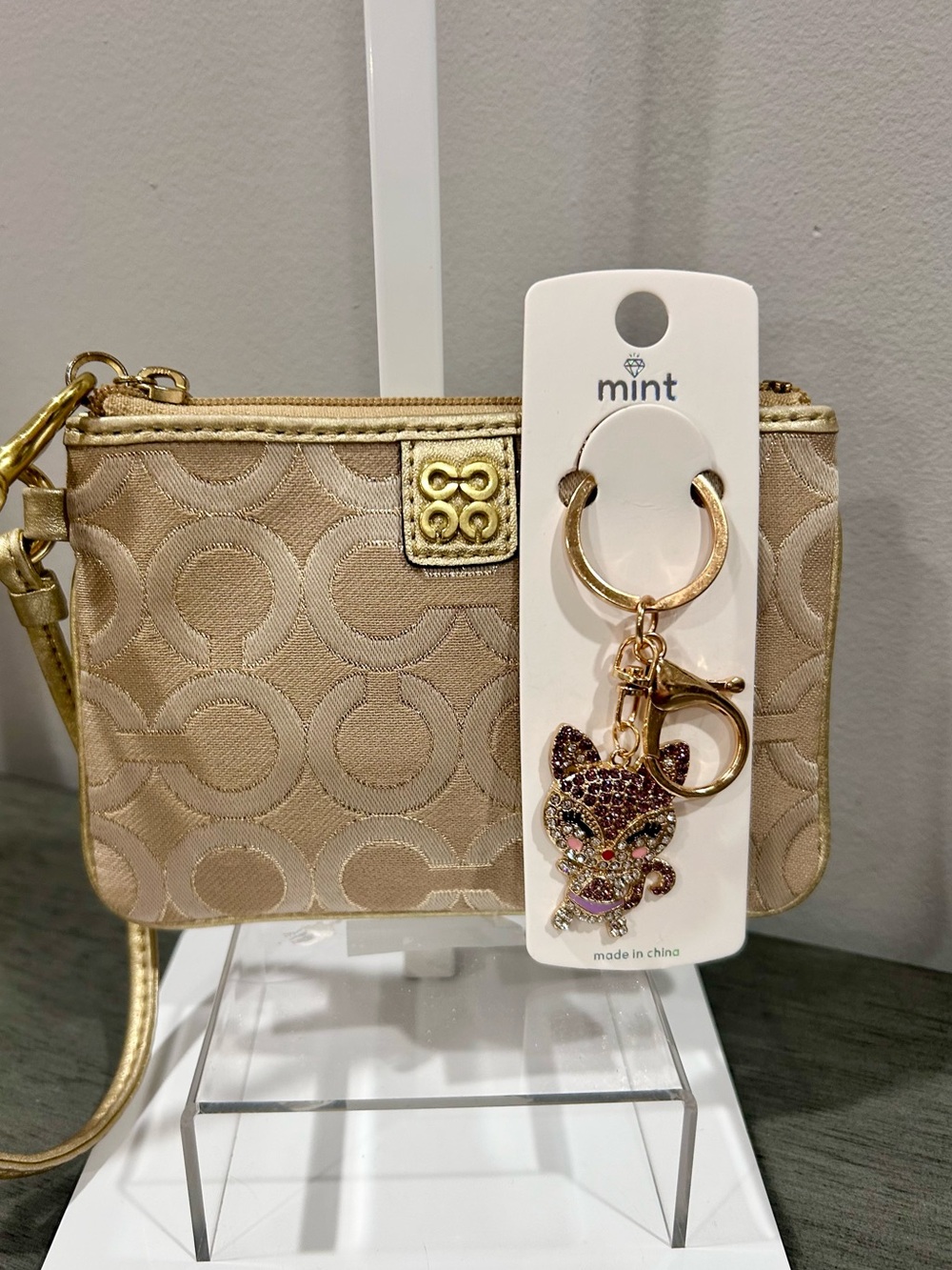 Coach Tan/Gold Wristlet Pouch with Cat Crystal Keychain